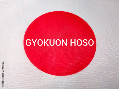 Japan flag with text GYOKUON HOSO photo