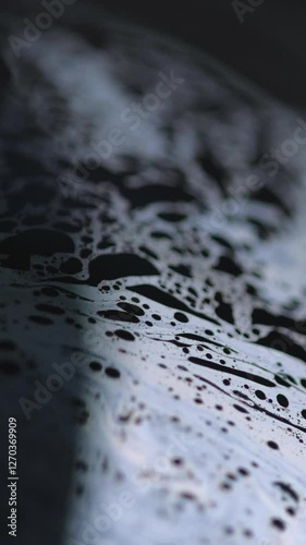 Wallpaper Mural Vertical video. Acid foam. Chemical fluid. Defocused blue color bubbles texture emulsion blend flow wave motion on dark black abstract art background. Torontodigital.ca