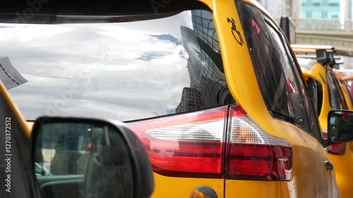 New York City Grand Central Terminal railway station, 42 street. Manhattan Midtown. Yellow taxi cab row, cars on Pershing Square, NYC, USA. American urban road traffic, car transport in United States.