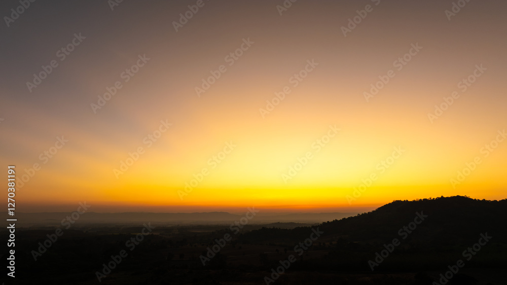 Enjoy a panoramic view of the skyline. The sun rises in the morning sky with colorful clouds. and beautiful cloud patterns In the soft light of the morning Enjoy a panoramic view of the skyline. The sun rises in the morning sky with colorful clouds. and beautiful cloud patterns In the soft light of the morning