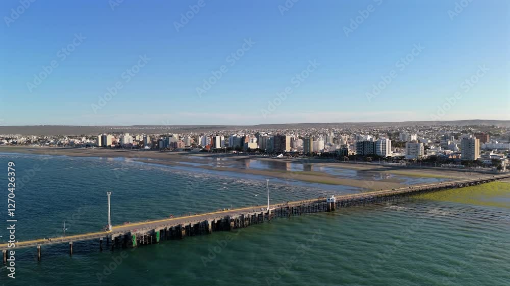 Aerial view of the pier and tourist city of Puerto Madryn. Chubut, Argentina. Drone. 4k. Aerial view of the pier and tourist city of Puerto Madryn. Chubut, Argentina. Drone. 4k.