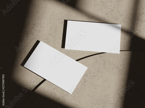 Elegant Business Card Mockup with Soft Lighting on Earthy Surface