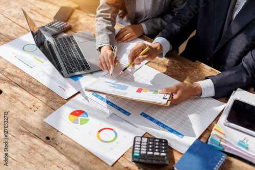 Bild auf Leinwand Title: Businessman team working at office with document on his desk, doing planning analyzing the financial report, business plan investment, finance analysis concept