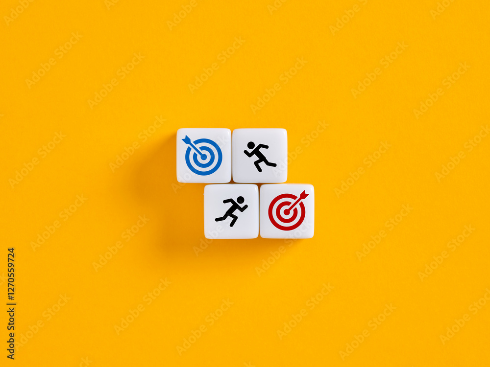 Businessman running towards his goals represented by target on dice Businessman running towards his goals represented by target on dice
