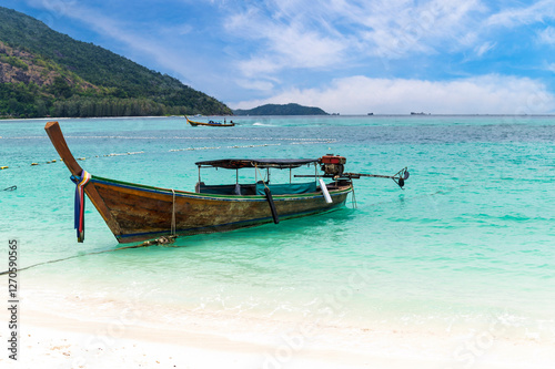 Obraz na płótnie Beautiful Andaman sea, Tropical Turquoise clear blue sea and white sand beach on sunset beach with blue sky background at Lipe Island, Satun, Thailand - summer vacation travel w salonie