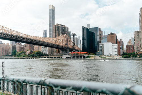 View of Queensboro Bridge and Manhattan skyline in New York duri photo