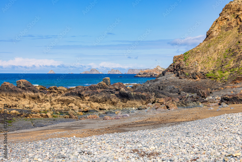 Rocks by the sea and a view to the horizon at a rocky coastline
