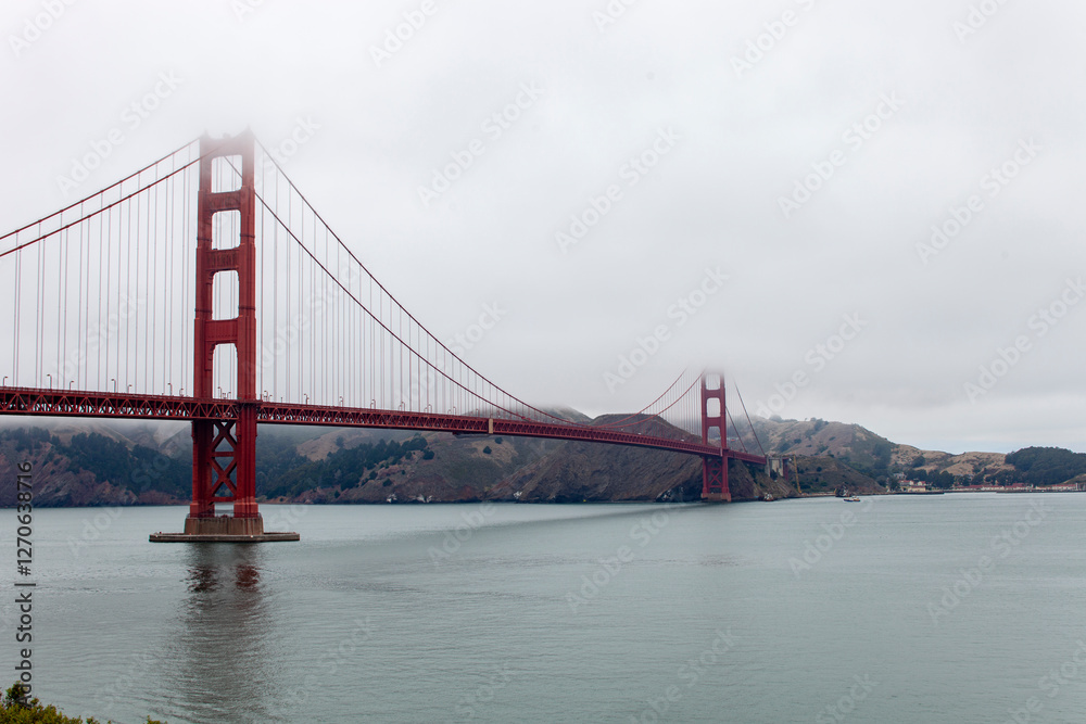 Golden Gate bridge on a foggy morning space on right Golden Gate bridge on a foggy morning space on right