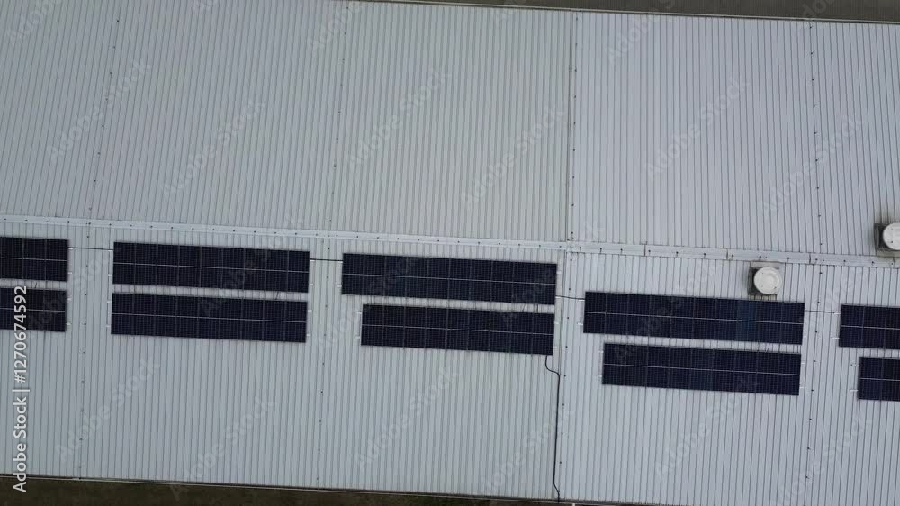 Sunset solar farm aerial view Renewable energy panels generating power Sunset solar farm aerial view Renewable energy panels generating power