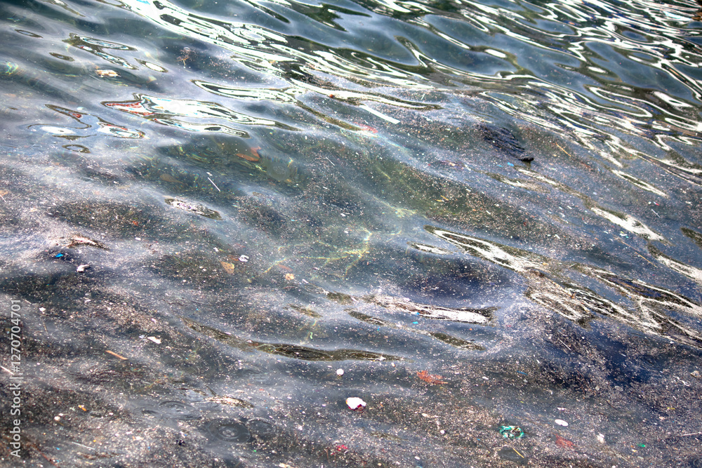 Sea or ocean pollution. The problem of mucilage in the Marmara Sea in Istanbul. Environmental pollution idea concept. Microplastic waste. Selective focus. Noisy, grainy. Sea or ocean pollution. The problem of mucilage in the Marmara Sea in Istanbul. Environmental pollution idea concept. Microplastic waste. Selective focus. Noisy, grainy.