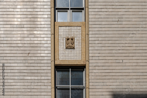A collection of various exterior windows on buildings, showcasing diverse architectural styles and materials.