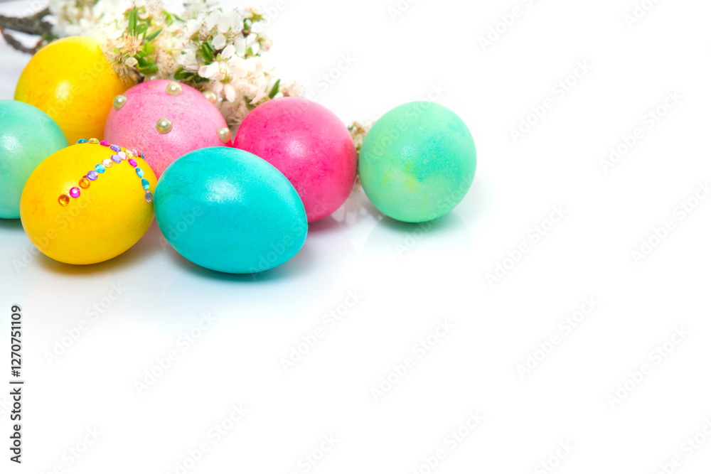 Easter eggs and flower branch on white background Easter eggs and flower branch on white background