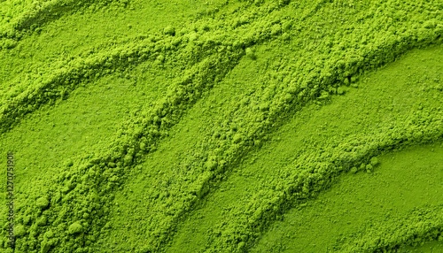 Close-up of vibrant green matcha powder, highlighting its fine, velvety texture and bright color. Ideal for Japanese tea culture, health-focused concepts, or modern aesthetics. Texture, background.