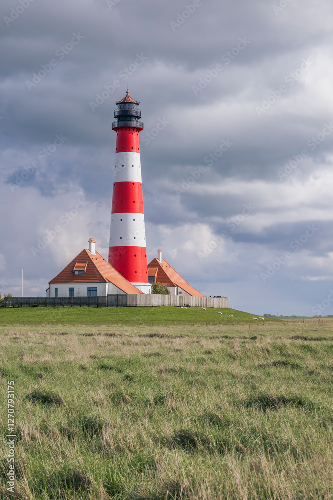 Westerhever lighthouse in North Frisia, Germany on a cloudy day Westerhever lighthouse in North Frisia, Germany on a cloudy day