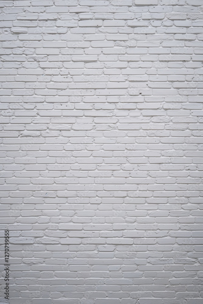 Fototapeta premium style and type of a white brick wall, showcasing a classic and rustic layout. The bricks are arranged in a horizontal pattern, with each row slightly offset from the one above, creating a traditional 