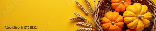 Wallpaper Mural Autumnal flat lay of pumpkins and wheat in a woven basket, natural, seasonal decor, yellow Torontodigital.ca