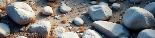 Granite boulders scattered in a natural, seemingly haphazard landscape, texture, geology