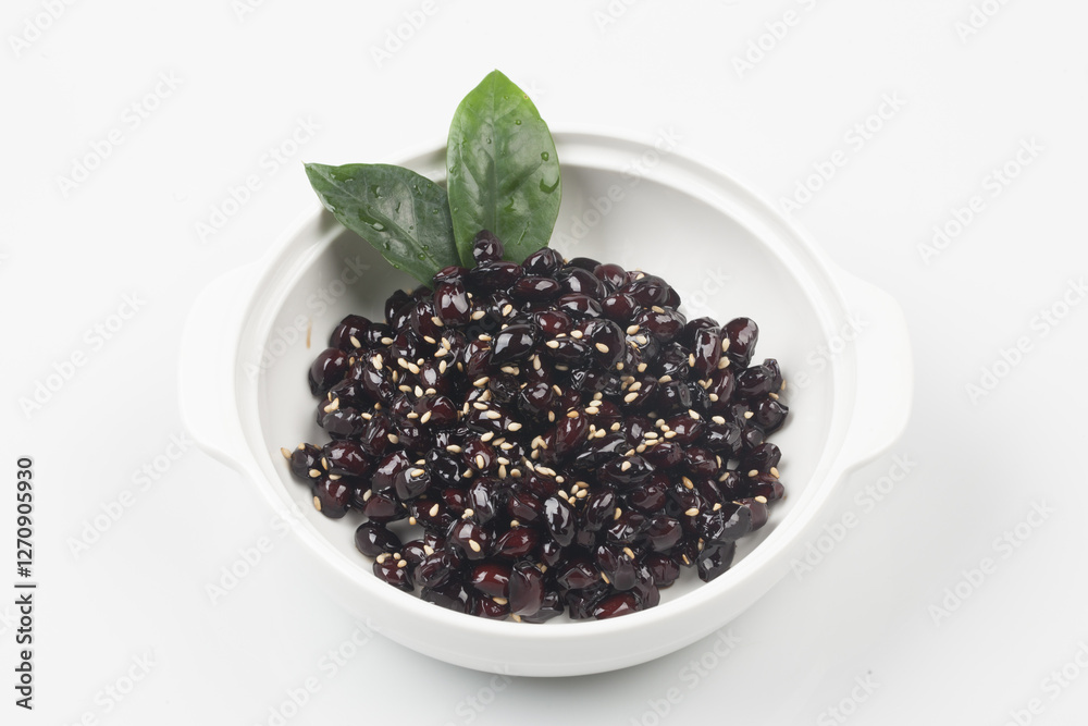 A side dish made by roasting or boiling soybeans and simmering them in soy sauce along with oil, sesame seeds, and starch syrup. A side dish made by roasting or boiling soybeans and simmering them in soy sauce along with oil, sesame seeds, and starch syrup.