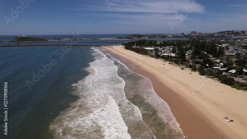 Foamy Waves Splashing At Stockton Beach In New South Wales, Australia - Aerial Shot photo