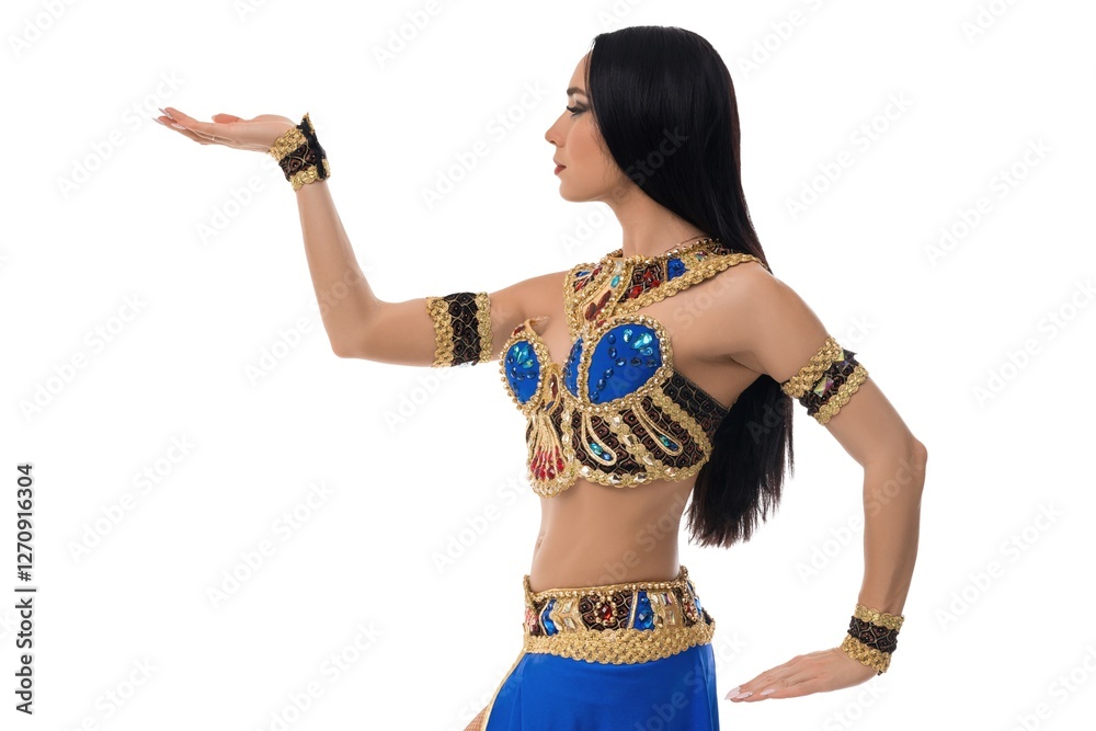 Dancer showcasing elegant belly dance movements with intricate costume details Dancer showcasing elegant belly dance movements with intricate costume details