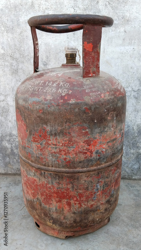 Indian Domestic LPG Gas Cylinder or Domestic Cooking gas Cylinder on land, gas cylinder on surface with space