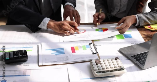 Analyze financial data and accounting record with calculator in meeting office, Accounting company charts and graphs banner, double exposure successful business finance and taxation planning concept.	