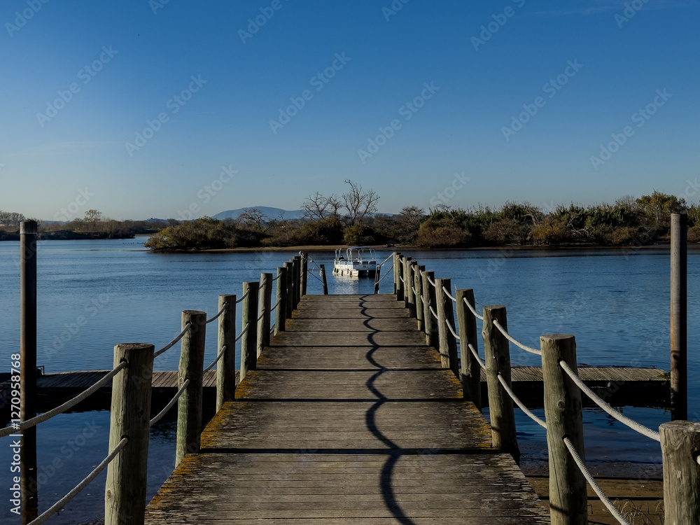 Fototapeta premium A boat in the pier at Escaroupim, Portugal