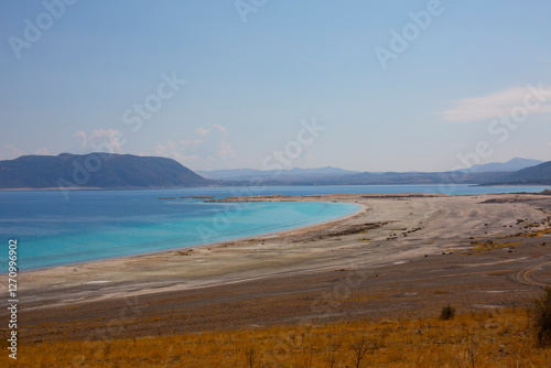 Lake Salda is located in the Yeşilova district of Burdur, 4 km from the town center, surrounded by forest-covered hills, rocky terrain and small alluvial plains. photo