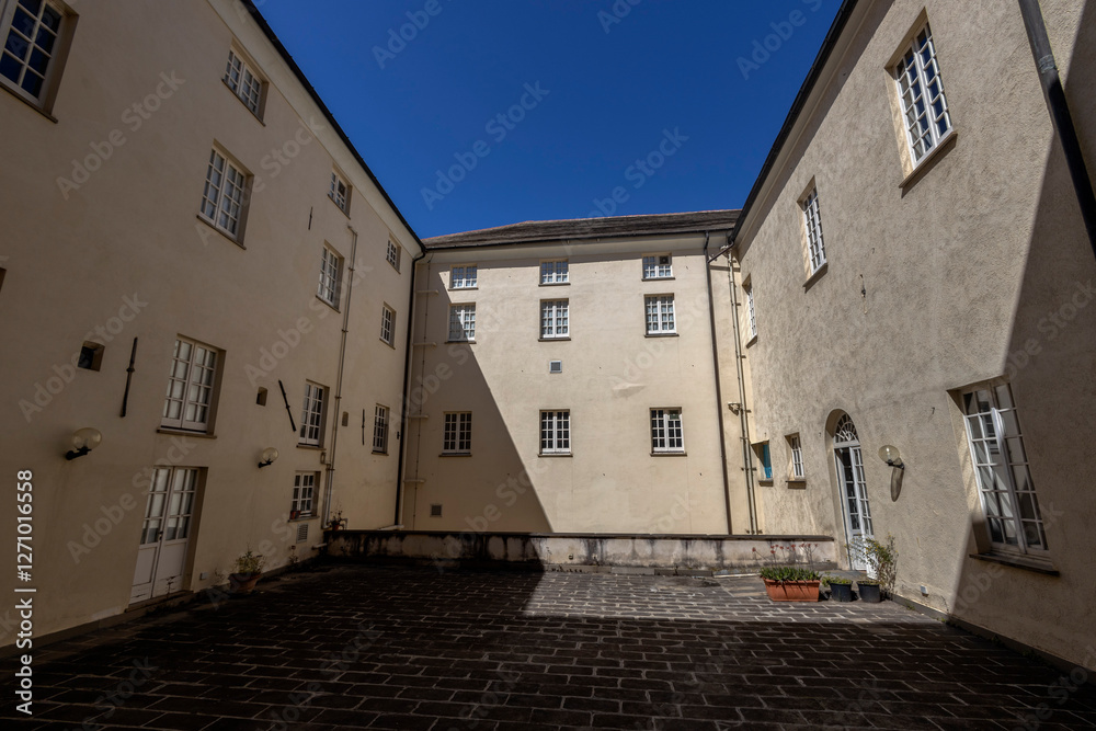 Fototapeta premium GENOA, ITALY, MAY 18, 2023 - The internal courtyard of the State Archives of Genoa, Italy