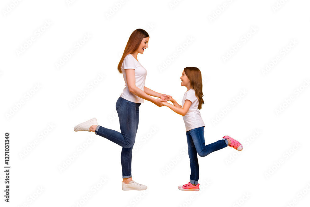 Full length profile side photo of pretty mom with her kid having long hairstyle smiling wearing white t-shirt isolated over yellow background Full length profile side photo of pretty mom with her kid having long hairstyle smiling wearing white t-shirt isolated over yellow background