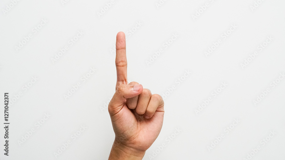 Man's hand with index finger up gesture on white background Man's hand with index finger up gesture on white background