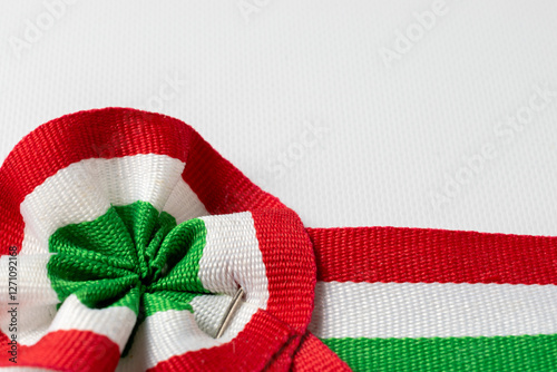 Hungarian tricolor cockade and white background photo