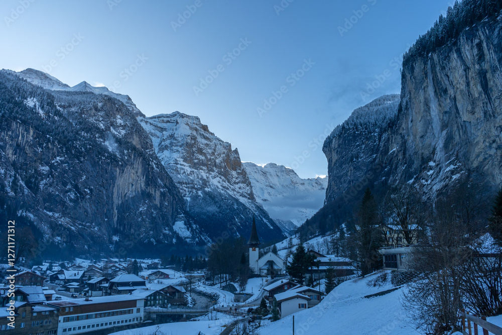 Fototapeta premium Lauterbrunnen Valley and Snowy Mountains in Winter Morning. Swiss Alps. Switzerland