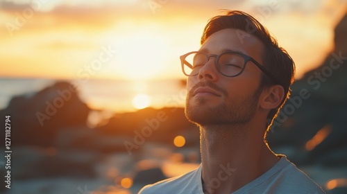 Myopia prevention with a man wearing glasses practicing yoga on a beach. Wellness, fitness, and eye health