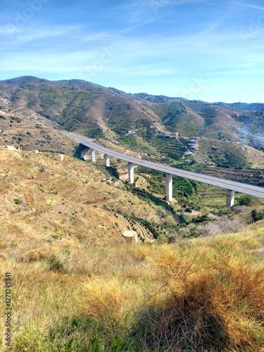 bridge in the mountains. View of the Autopista A7 above Almuñécar in Andalusia.  The Autopista del Mediterráneo is part of Europastraße 15. The motorway begins on the border with France near La Jonque photo