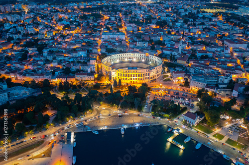 Aerial view of the historic Roman amphitheater of Pula, Istria peninsula. Ruins of the Roman Colosseum Arena in Pula, Croatia. UNESCO World Heritage.
