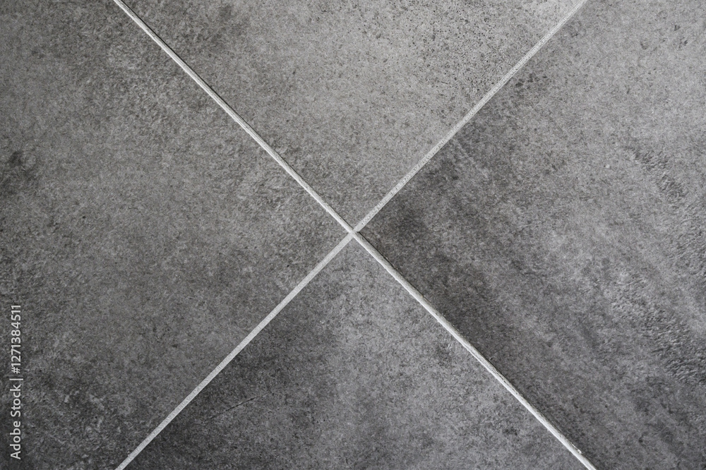 Fototapeta premium Texture of dark grey flooring ceramic tiles as background