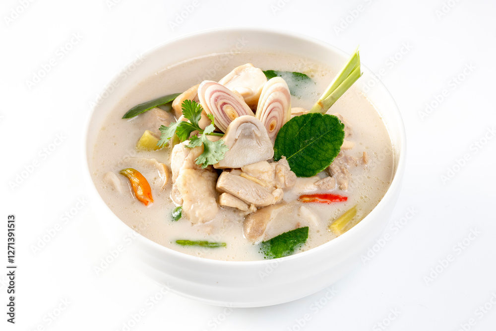 Tom Kha Gai (Thai Chicken Coconut Soup) on a white background Tom Kha Gai (Thai Chicken Coconut Soup) on a white background
