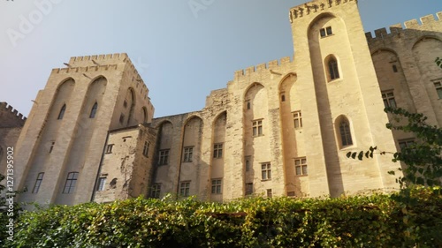 Fortified walls and towers with battlement of rear part of the  Palais des Papes in Avignon, France