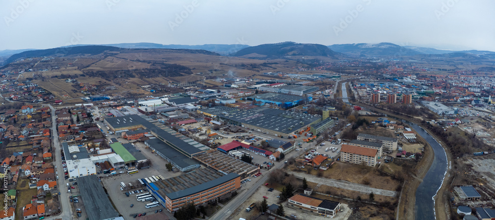 Fototapeta premium Aerial view of the industrial area in Odorheiu Secuiesc city - Romania