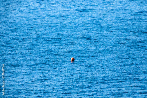 High-angle view of the buoy on the sea photo