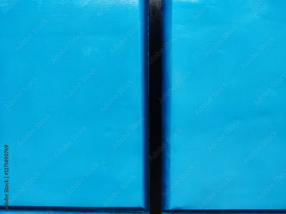 Fototapeta premium iron fence with blue and black color