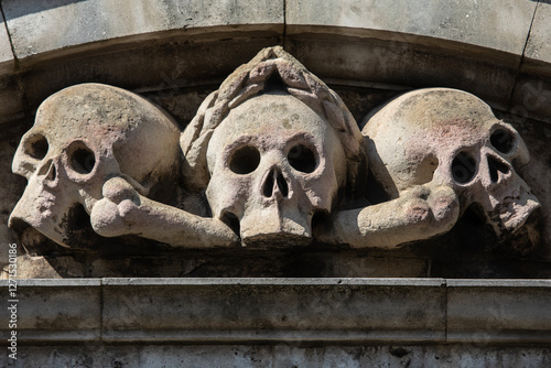 Skull and Crossbones at St. Olaves, Hart Street in London, UK photo