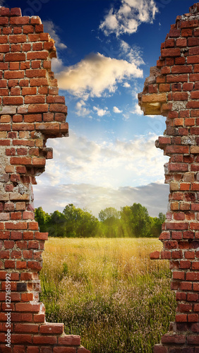 Wallpaper Mural Hope and freedom concept, Brick wall with hole revealing lush greenery, natural light. Royalty high-quality free best stock of broken brick wall revealing a serene landscape with mountains, trees Torontodigital.ca