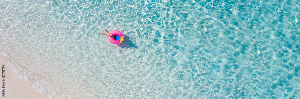 Obraz premium Top above high angle aerial drone view of her she attractive girl floating on rubber ring ocean clear water leisure enjoy joy day daydream relax sunny hot weather destination