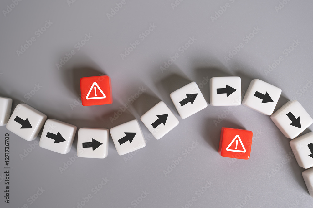 arrow avoid risk warning sign on red cube with copy space. Risk management concept with preventive plan for any accident or unplan incident to protect business or system from failure or crisis. arrow avoid risk warning sign on red cube with copy space. Risk management concept with preventive plan for any accident or unplan incident to protect business or system from failure or crisis.