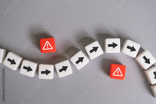 arrow avoid risk warning sign on red cube with copy space. Risk management concept with preventive plan for any accident or unplan incident to protect business or system from failure or crisis.