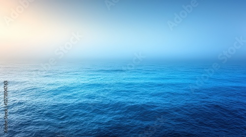 Serene Ocean Landscape with Gentle Waves and a Sky Gradient from Warm Orange to Cool Blue (Nature, Ocean, Waves, Sky)
