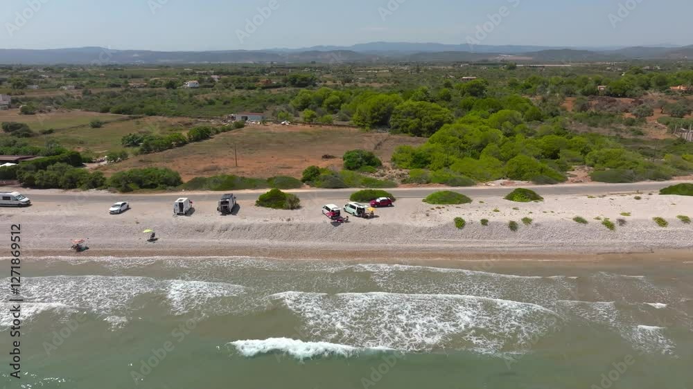 Aerial view of a beach with people on vacation in Spain