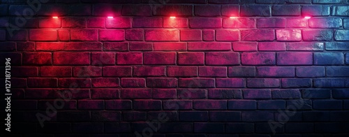 Colorful lights illuminate a textured brick wall in an urban setting at night